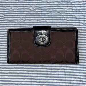 Coach Deep Brown monogram wallet with lilac interior